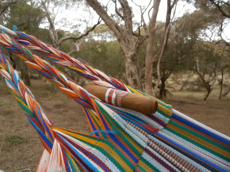 Edmundo Dantes Conde 54 Edición Regional Mexico 2011 half smoked in a hammock