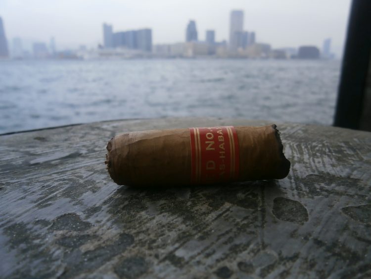 Partagás Serie D No. 4 final third, with Kowloon in the background