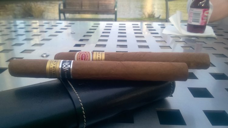 Romeo y Julieta Churchill Reserva Cosecha 2008 unlit, alongside a regular Churchills